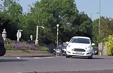 Car going around the roundabout